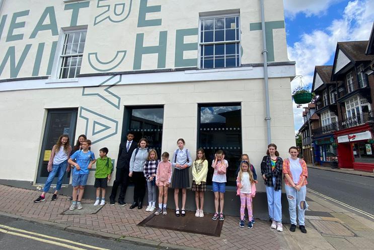 young people stood outside theatre