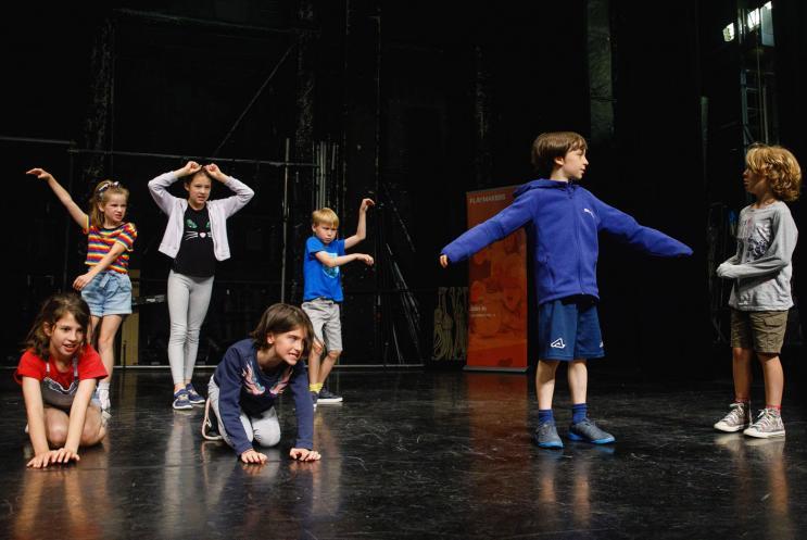 Young people on a theatre stage