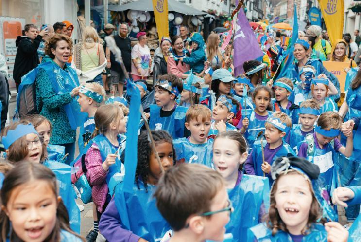 Young people performing in a street carnival