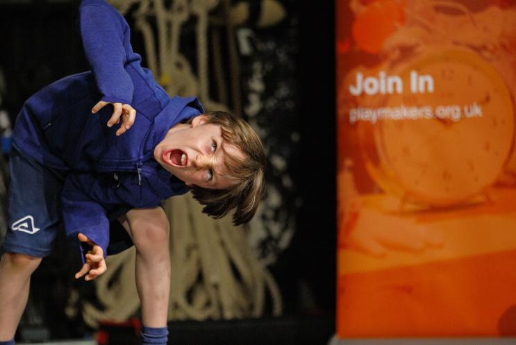 Boy performing on stage
